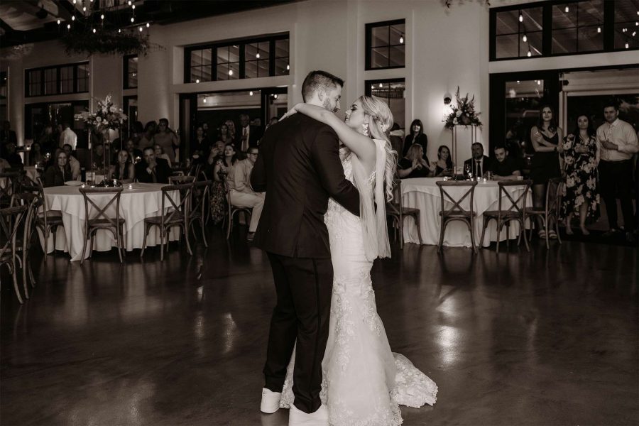 Bride and groom dance at their Carriage House wedding reception in Oconomowoc, WI.