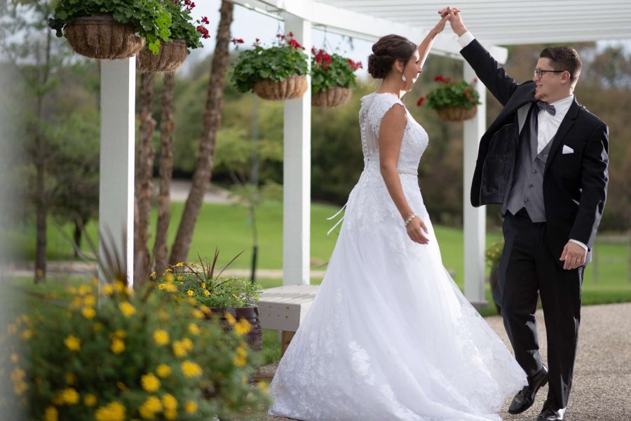 Bride and groom dance outdoors at the Ingleside Hotel near Pewaukee, WI