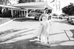 Bride walks to wedding in Designed by Inbal Dror