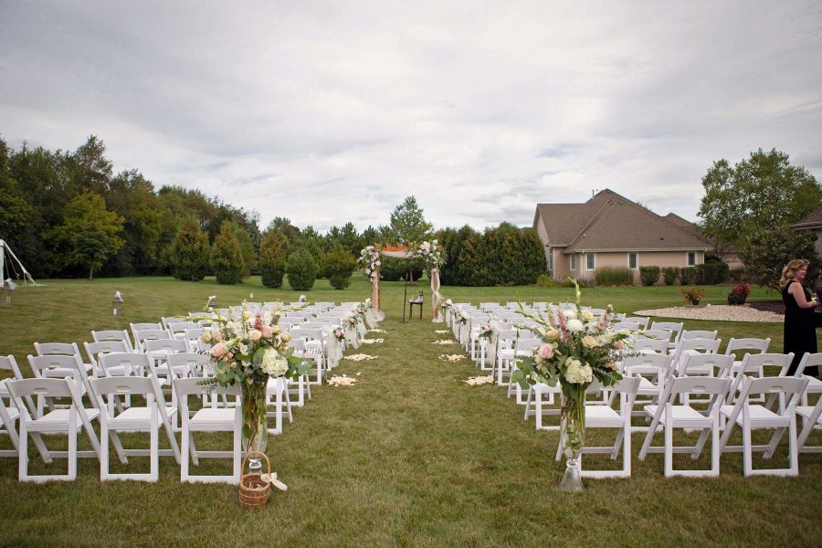 Ceremony was held on the couple property with chairs and set-up by Brookfield Party Rental