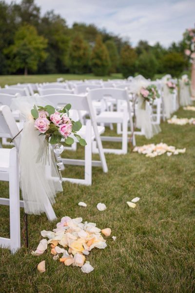Flowers and piles of petals line the walkway