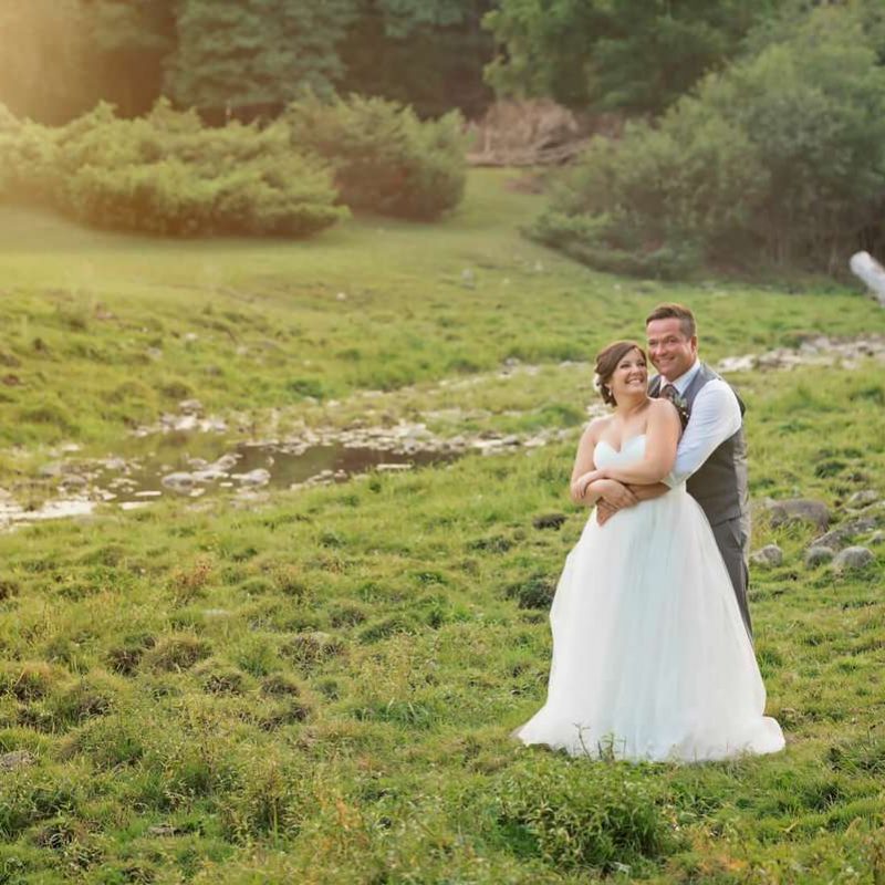 Wedding couple in green field