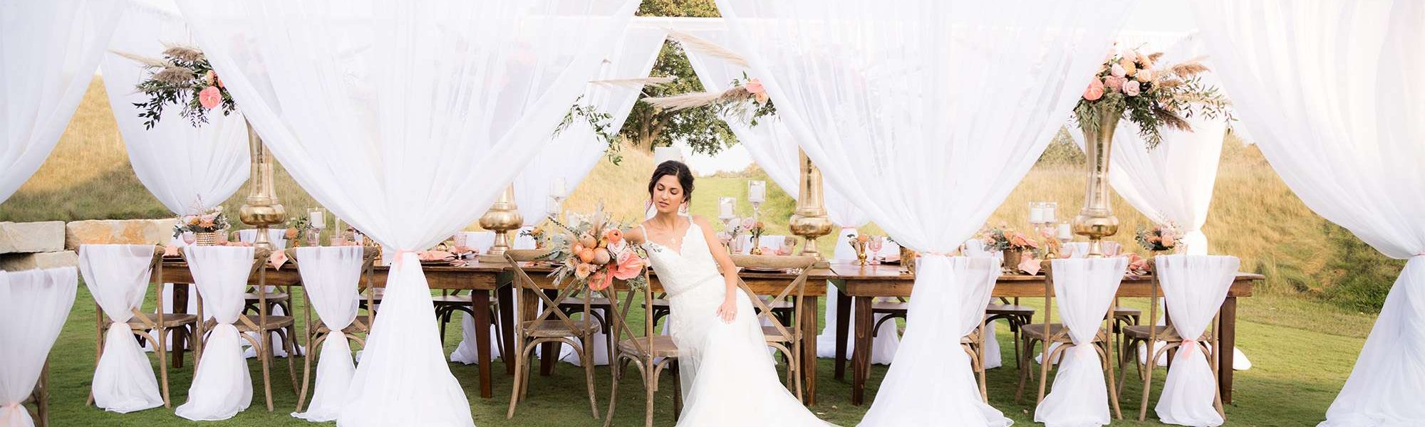 Stunning bride sits at her head table