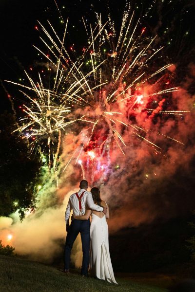 Bride and groom watch spectacular fireworks display at their Wisconsin wedding- Allysha Noelle Photography