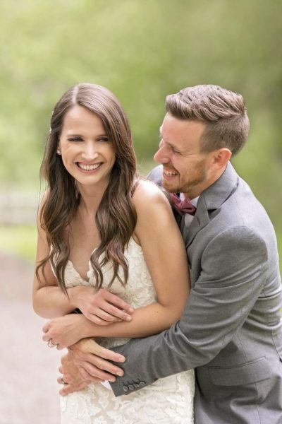 Bride and groom laugh together- Allysha Noelle Photography