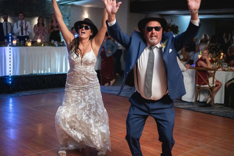 Sydney and her dad dance to a Blues Brothers routine
