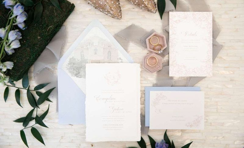 Layflat wedding invitation suite in pinks and blues by Paperwhites Milwaukee.