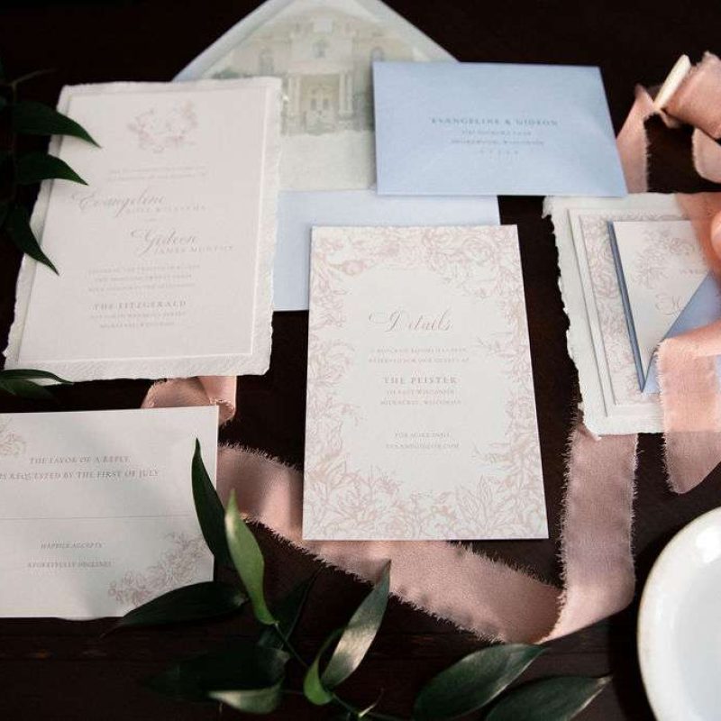 Layflat wedding invitation suite by Paperwhites MKE with blue and dusty pink coloring.